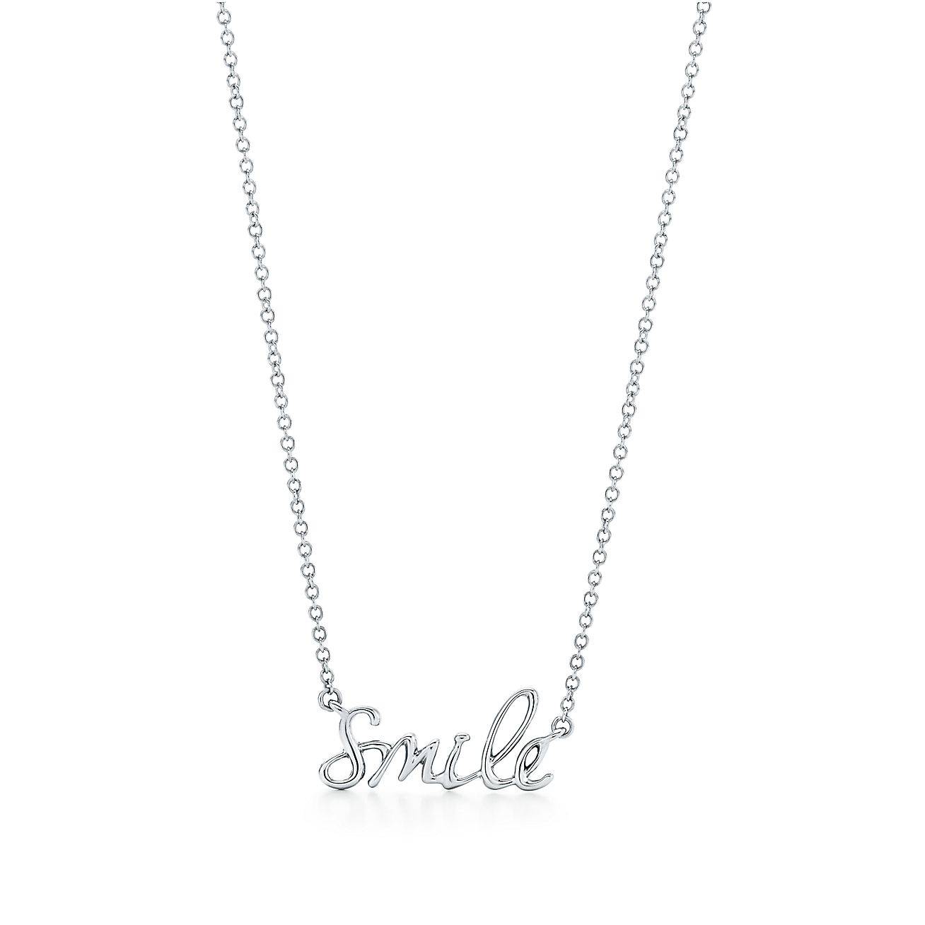 T*f*ny  palomas graffiti smile pendant