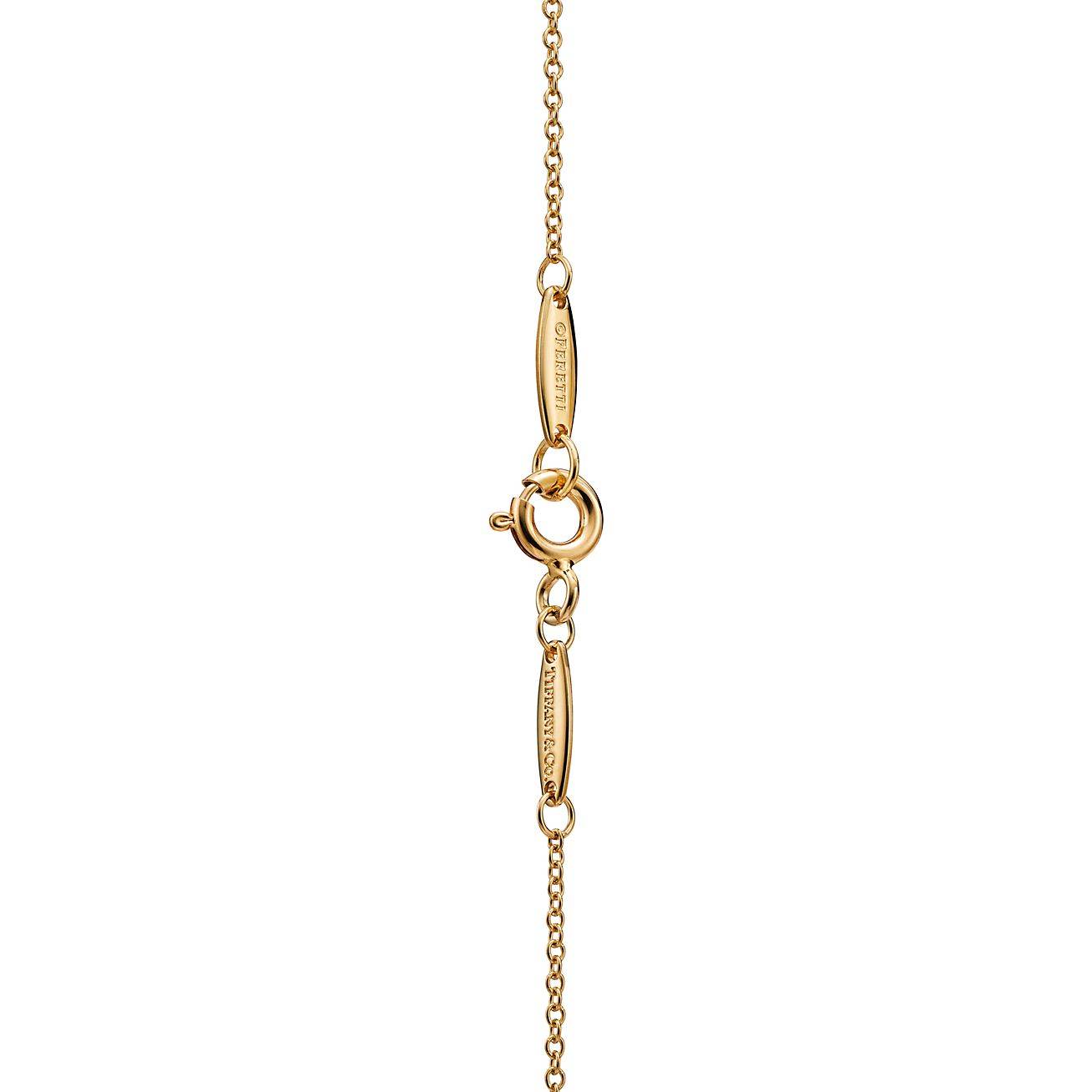 T*f*ny  elsa peretti® diamonds by the yard® single diamond pendant in yellow gold