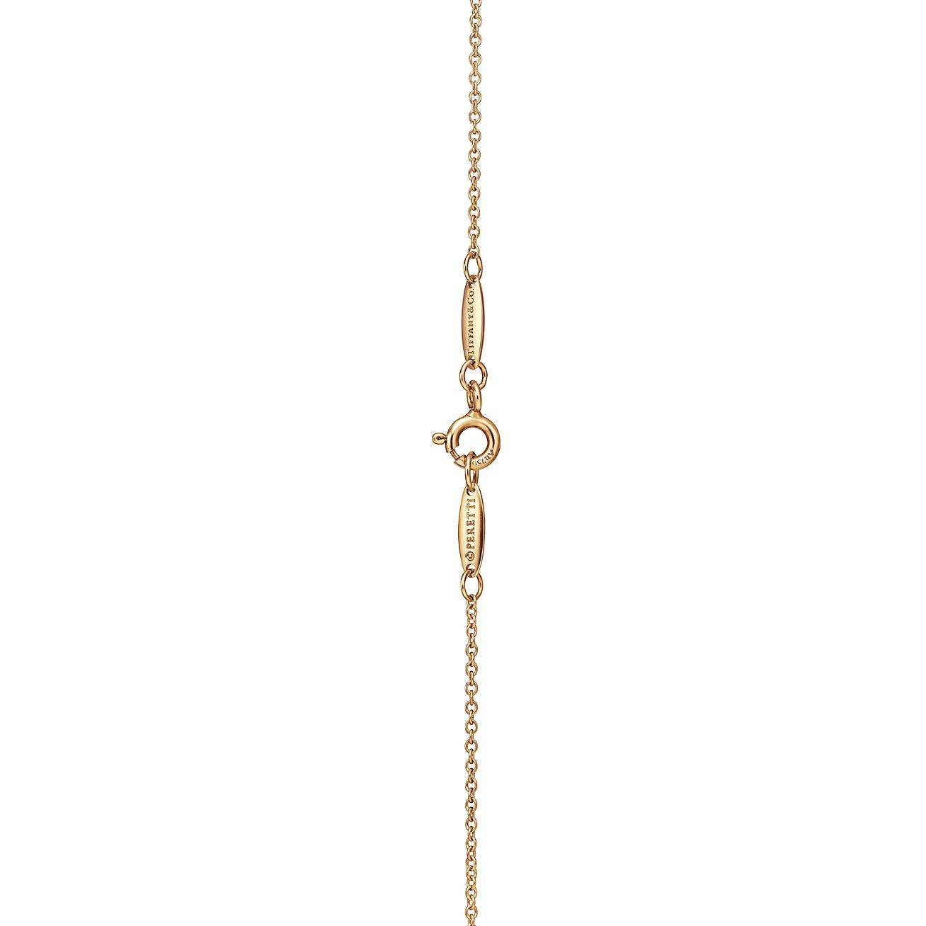 T*f*ny  elsa peretti® open heart pendant in yellow gold with emeralds, 16 mm