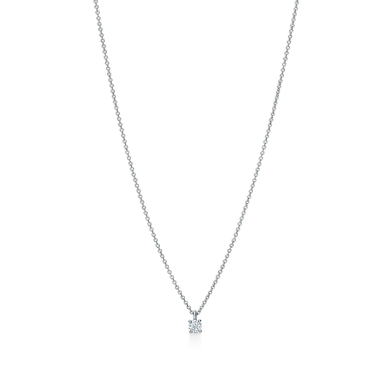 TIFFANY SOLITAIRE DIAMOND PENDANT IN PLATINUM