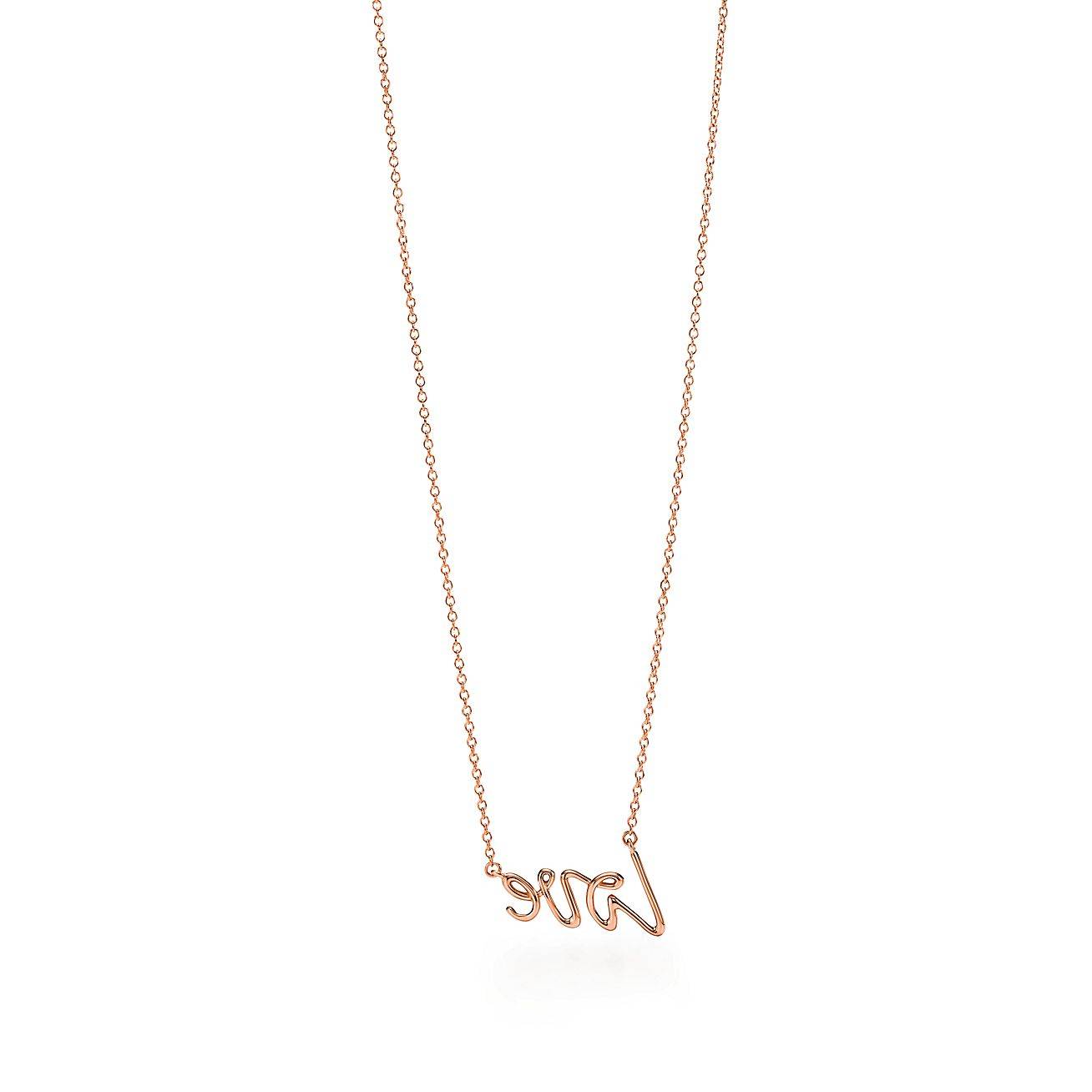 T*f*ny  palomas graffiti love pendant